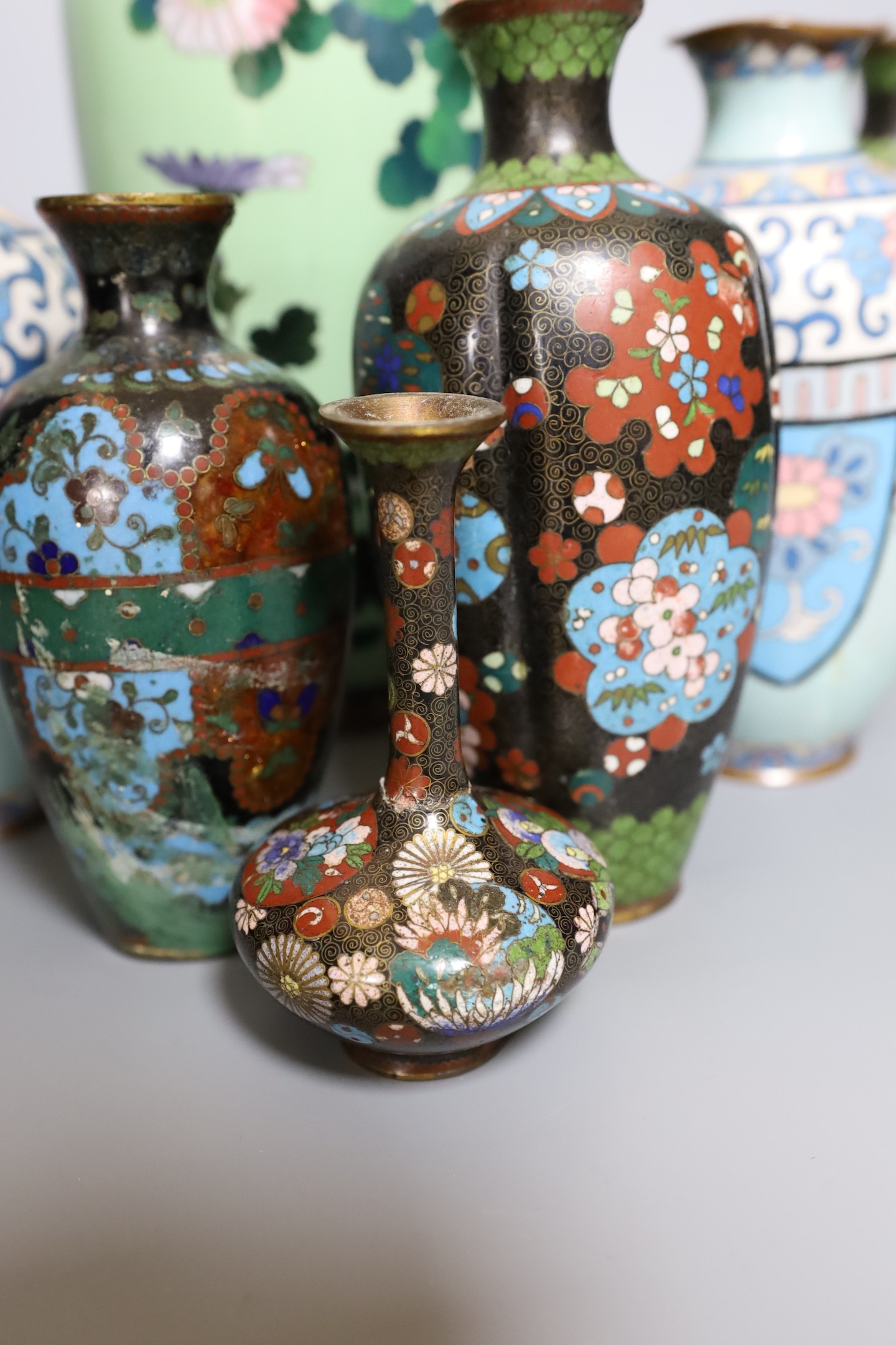 Assorted Japanese Meiji cloisonne vases, tallest 30cm